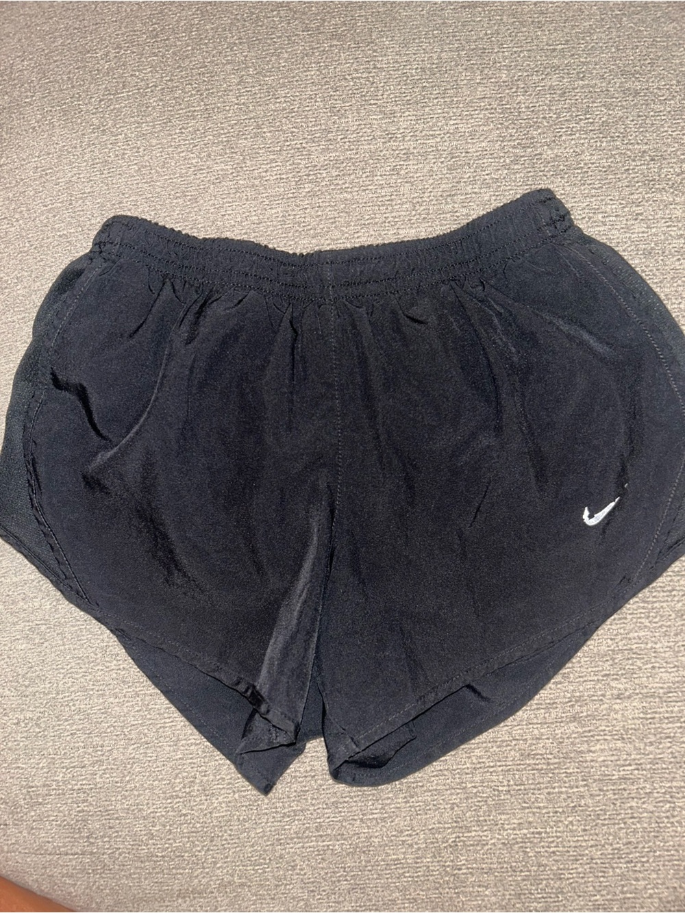 Nike Kid’s Black Athletic Shorts with White Swoosh